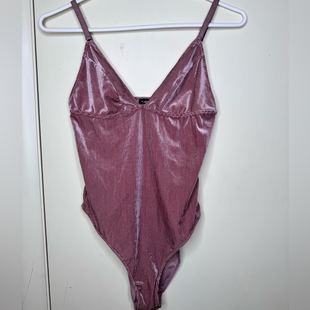 Pink body suit